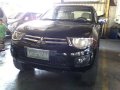 Mitsubishi Strada 2011 truckl black manual for sale -3