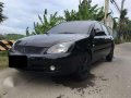 2012 mitsubishi lancer GLX (pyrenese black color)-0