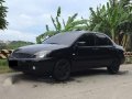 2012 mitsubishi lancer GLX (pyrenese black color)-6