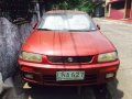 Mazda 323 red-1
