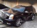 Cadillac Escalade 2010 vs. Ford Expedition Tahoe Suburban Patrol Landc-5