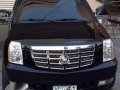 Cadillac Escalade 2010 vs. Ford Expedition Tahoe Suburban Patrol Landc-2