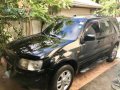 2004 Ford Escape XLS 4x2-5