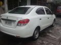 White Mitsubishi Mirage g4 sedan 2014-2