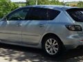 2008 mazda 3 hatchback and  2005 mitsubishi Montero-1