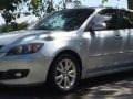 2008 mazda 3 hatchback and  2005 mitsubishi Montero-0