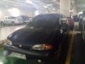 car kia avella hatchback-3