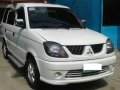 2011 honda jazz 1.5 2010 mitsubishi adventure glx-4