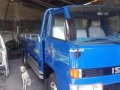 Isuzu Elf Dropside-8
