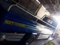 Isuzu Elf Dropside-10
