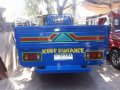 Isuzu Elf Dropside-7