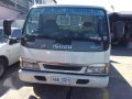 Isuzu ELF NPR Dropside 14ft with Lifter 4HJ1-0