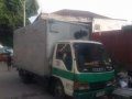 Isuzu Elf NKR Giga 4HF1 6W 14ft aluminum closevan.-0