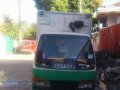 Isuzu Elf NKR Giga 4HF1 6W 14ft aluminum closevan.-1