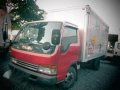 1145 #4 Isuzu Elf Wing Van Truck-0
