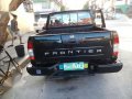 2007 model Nissan Frontier manual.diesel tag Mitsubishi Strada-1