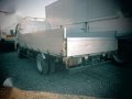 1145 #13 Isuzu Elf Dropside Cargo AS Truck-3