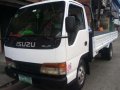 Isuzu Elf Giga 14ft Dropside-1