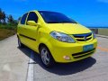 Yellow car Chana Benni 2008 model year. 1.3 L gas. Manual. Local.-0