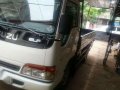 2004 Isuzu Elf 6-Wheeler Dropside Truck-1