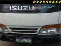 isuzu elf giga nkr 14ft close van-6