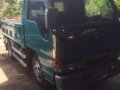 isuzu elf mini dump 2010-1