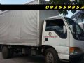 isuzu elf giga nkr 14ft close van-1