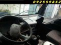 isuzu elf giga nkr 14ft close van-4