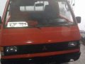 Well maintained Mitsubishi L300 Dropside Gas 1998 RED color for sale-0