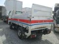 1128 #6 Isuzu Elf Dropside Cargo LM ST Truck-2