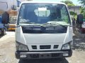 JAPAN Isuzu Elf Giga Nkr 14FT Dropside Eagle Eye CBU forward canter-1