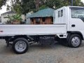 Isuzu Elf Giga Nkr Cat Eye 10FT Dropside Japan CBU forward-11