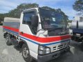 1128 #6 Isuzu Elf Dropside Cargo LM ST Truck-1