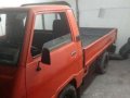 Well maintained Mitsubishi L300 Dropside Gas 1998 RED color for sale-1