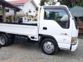 Isuzu Elf Giga Nkr Cat Eye 10FT Dropside Japan CBU forward-2