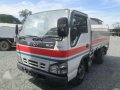 1128 #6 Isuzu Elf Dropside Cargo LM ST Truck-0