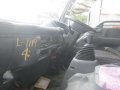 1119 #4 Isuzu Elf Dropside Cargo LM Truck-0