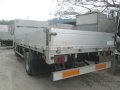 1119 #4 Isuzu Elf Dropside Cargo LM Truck-3