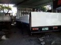 Isuzu Elf 14ft drop side with lifter-4