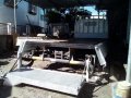 Isuzu Elf 14ft drop side with lifter-9
