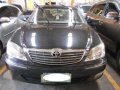 Toyota Camry 2.6 G 2004 AT Black -0