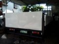 Isuzu Elf 14ft drop side with lifter-5