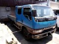 Canter Dropside 4d33 double cab giga-0