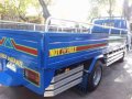 Isuzu Elf Dropside-4