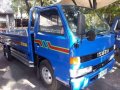 Isuzu Elf Dropside-0