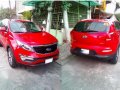 KIA 2015 acq.sportage. red matic .-2