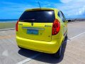 Yellow car Chana Benni 2008 model year 13 L gas Manual Local-2