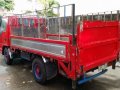 Isuzu Elf Dropside stainless with POWER LIFTER 10 ft. Single tire GIGA-7