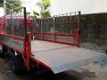 Isuzu Elf Dropside stainless with POWER LIFTER 10 ft. Single tire GIGA-5