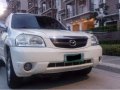 Mazda Tribute 2006 SUV White For Sale-0